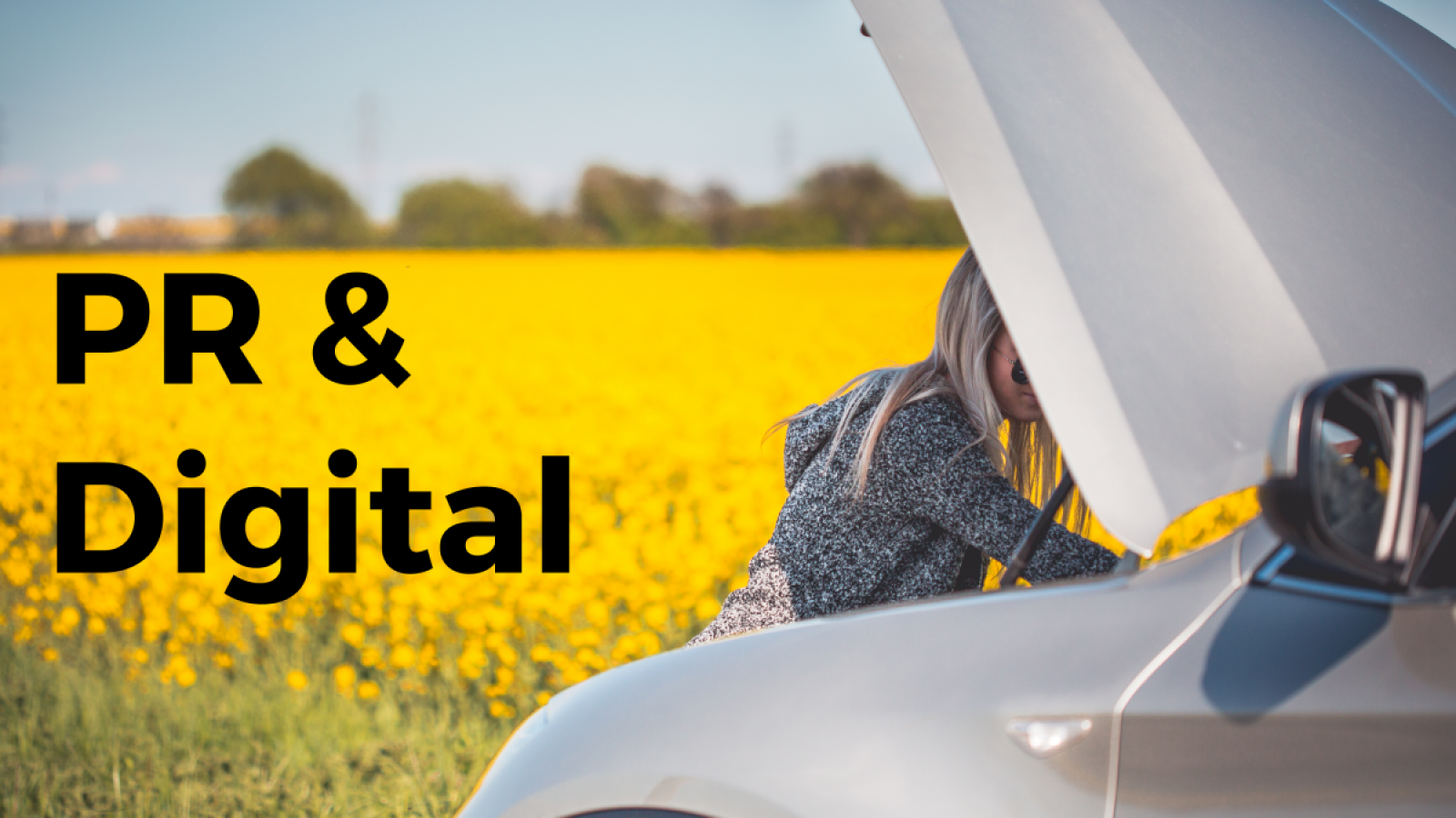 young-woman-trying-to-check-and-repair-her-broken-car-picjumbo-com